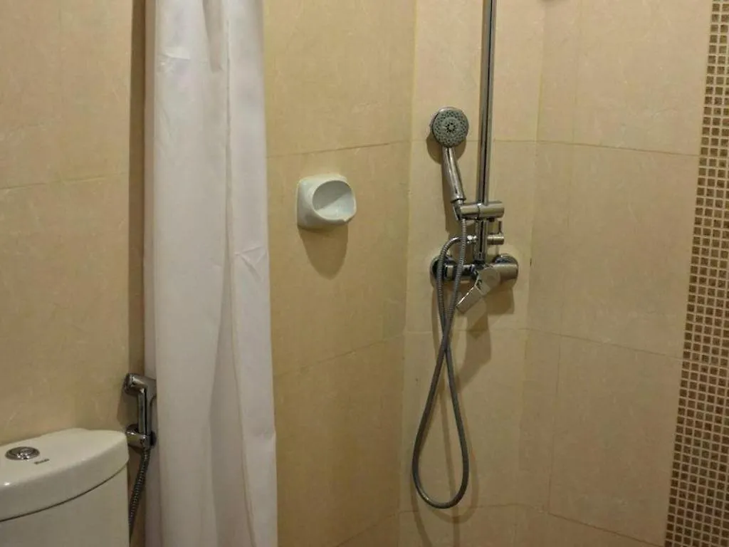 فندق أجنحة بيريدوت Davao City 3*,