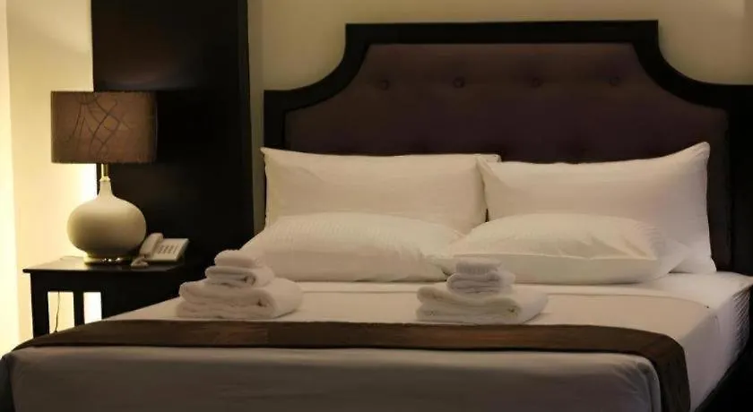 فندق أجنحة بيريدوت Davao City 3*,